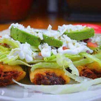 La Cabana Mexican Restaurant - TAMALES CHILANGO 3 fried tamales topped with cheese dip lettuce, sour cream, pico de Gallo mexican cheese and avocado slices - Mexican Near Me - Comer, Georgia