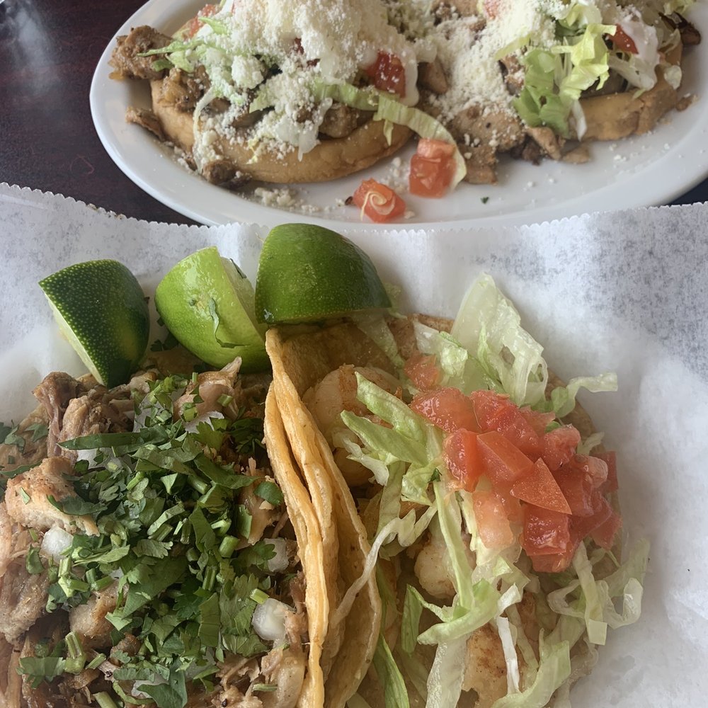 Carnitas and shrimp tacos. Chicken sopes.