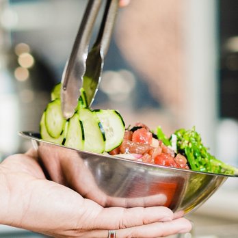 Poke Noke - a person holding a bowl of food - Poke Near Me - Sacramento, California Poke Noke - a person holding a bowl of food - Poke Near Me - Sacramento, California