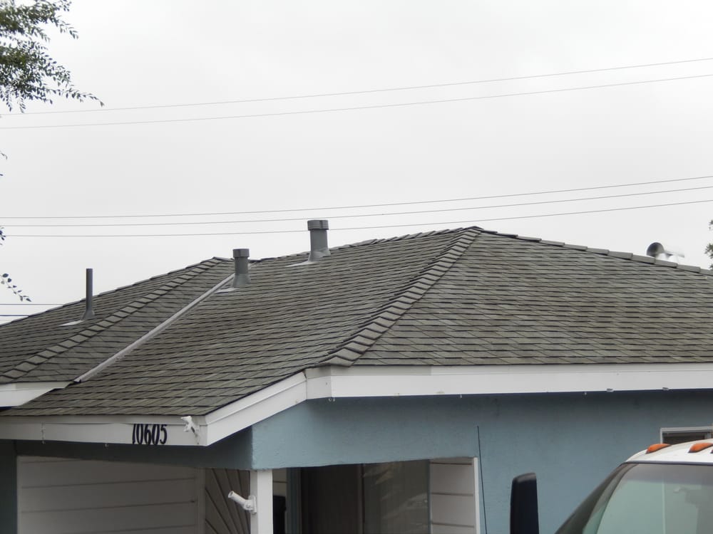 Slide of Dick Madsen Roofing