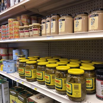 Mediterranean Taste - jars of food on shelves in a grocery store - Grocery Near Me - Flushing, New York
