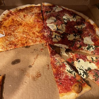 Tony's Pizza - Half margarita half cheese. - Pizza Near Me - Flagler Beach, Florida Tony's Pizza - Half margarita half cheese. - Pizza Near Me - Flagler Beach, Florida