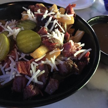 BottleDog Bites & Brews - Montreal style poutine with vegan cheese and gravy on the side to accommodate for gf's dairy allergy. - Beer Bar Near Me - Cary, North Carolina