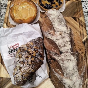 Rendez-Vous - Cranberry Walnut bread, an almond tart, a blueberry tart, & their popular almond croissant. All made that morning! - Bakeries Near Me - Sarasota, Florida Rendez-Vous - Cranberry Walnut bread, an almond tart, a blueberry tart, & their popular almond croissant. All made that morning! - Bakeries Near Me - Sarasota, Florida