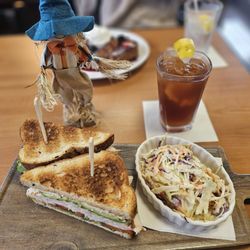 The Three Mothers Cuisine & Bakery - The new turkey club on a delicious multi grain, with a side of coleslaw.