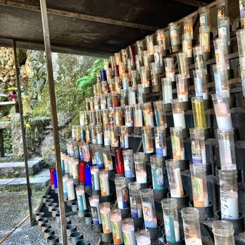 The Grotto - Prayer candles next to the outdoor worship area. - Botanical Gardens Near Me - Portland, Oregon The Grotto - Prayer candles next to the outdoor worship area. - Botanical Gardens Near Me - Portland, Oregon