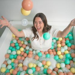 Children's Therapy Center - Mrs. Lisa playing in the ball pit!