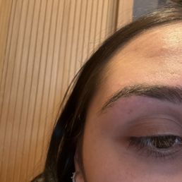 thinned out uneven eyebrow