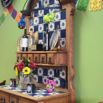 Bertha's Kitchen - Here is their hutch with some wine on it - Mexican Near Me - Wauchula, Florida Bertha's Kitchen - Here is their hutch with some wine on it - Mexican Near Me - Wauchula, Florida