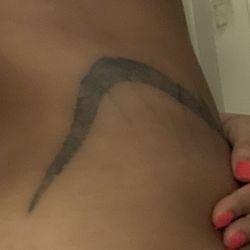 Brass Knuckles Ink Tattoo Studio - Back right side tattoo, note the dissimilarities between what should be identical tattoos.