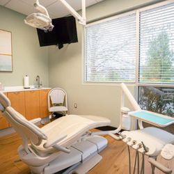 Penterson & Booth Family Dentistry - Modern treatment room at Penterson & Booth in Midlothian, VA, with natural light and advanced dental equipment