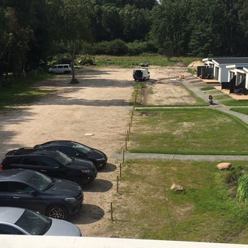 Aparthotel Königslinie - Aussicht auf den Parkplatz Bzw. auf den Innenhof des Hotels. - Hotels Near Me - Sassnitz, MV Aparthotel Königslinie - Aussicht auf den Parkplatz Bzw. auf den Innenhof des Hotels. - Hotels Near Me - Sassnitz, MV
