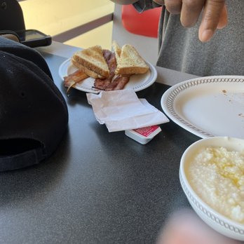 Waffle House - a man eating breakfast - Diners Near Me - Murfreesboro, Tennessee