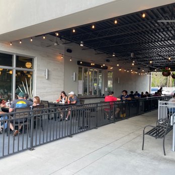Metro Diner - Outdoor seating on right side. White fence. - American Near Me - Tampa, Florida Metro Diner - Outdoor seating on right side. White fence. - American Near Me - Tampa, Florida