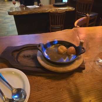 Tipsy Yeti Restaurant & Bar - Flaming cheese balls in brandy... wow! - Sports Bars Near Me - Berkeley, California