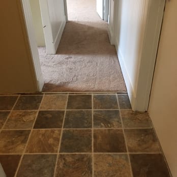JCA Floor Coverings - a hallway with a tile floor - Carpet Installation Near Me - North Charleston, South Carolina