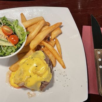 Tony's Steak and Seafood - Pacific:  stuffed with crab meat, topped with prawns.  I scraped most the sauce off to the side. - Seafood Near Me - Auckland, AUK