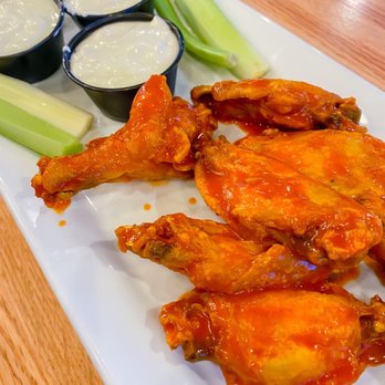 Blue Shark Ale House - Traditional medium sauce wings - Sports Bars Near Me - Urbandale, Iowa