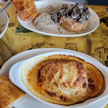 Nonna Tata - Top: Vitello Ai Funghi(breaded veal patties with a risotto cake topped with a mushroom cream sauce. Bottom: Lasagne alla Bolognese - Italian Near Me - Fort Worth, Texas Nonna Tata - Top: Vitello Ai Funghi(breaded veal patties with a risotto cake topped with a mushroom cream sauce. Bottom: Lasagne alla Bolognese - Italian Near Me - Fort Worth, Texas