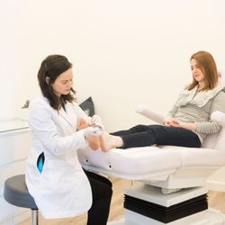 Barefoot Medical Spa - Dr. Julie Shaheen, Barefoot's Medical Director, treats a client