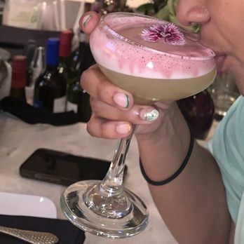 Xochi - Her first sip was a joy to watch - Mexican Near Me - Houston, Texas Xochi - Her first sip was a joy to watch - Mexican Near Me - Houston, Texas