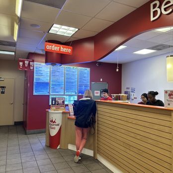Smoothie King - a woman standing at a counter - Juice Bars & Smoothies Near Me - Greensboro, North Carolina Smoothie King - a woman standing at a counter - Juice Bars & Smoothies Near Me - Greensboro, North Carolina