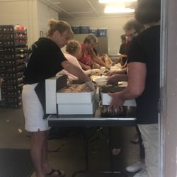 Southport Police Office - Volunteers pass out the food