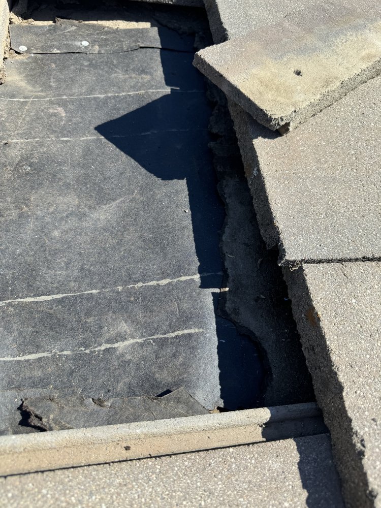 Slide of Top Tier Roofing