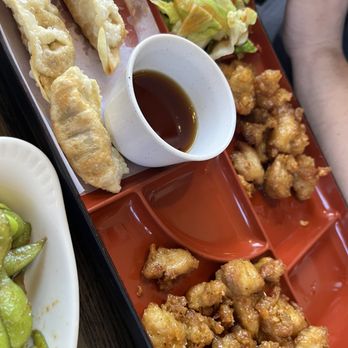 Minato Sushi - Bento box with sesame chicken, ginger salad, beef gyoza. - Sushi Bars Near Me - Lake Forest, California Minato Sushi - Bento box with sesame chicken, ginger salad, beef gyoza. - Sushi Bars Near Me - Lake Forest, California