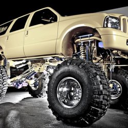 Krazy House Customs - Krazy Houses Custom built 2002 Excursion with 30inch lift