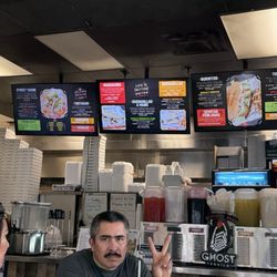 El Serranito Taqueria - Overhead menu board. You order at the counter and they will bring your food to you