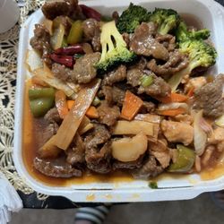 Oriental Cafe - Combo #5 beef and broccoli/pepper and onions steak /spicy beef /chicken with garlic sauce