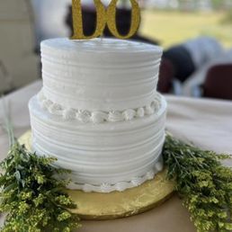 Vanilla buttercream frosting, vanilla cake and strawberry filling.