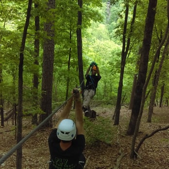 Ozark Mountain Ziplines - He was on the lighter side and needed help making it across so the guide pulled the rope down to help him keep coming. - Ziplining Near Me - Eureka Springs, Arkansas Ozark Mountain Ziplines - He was on the lighter side and needed help making it across so the guide pulled the rope down to help him keep coming. - Ziplining Near Me - Eureka Springs, Arkansas