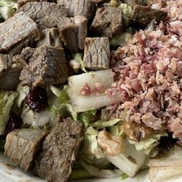 Steak & bacon salad with the dressing mixed in Steak & bacon salad with the dressing mixed in