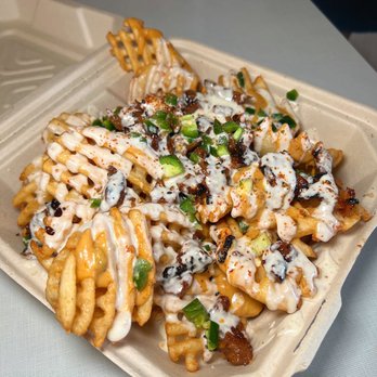 Sunny's Backyard - Loaded Fries - Pubs Near Me - Austin, Texas