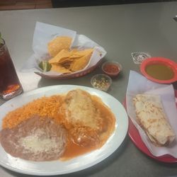 Los Capitanes Mariscos y Taqueria - Combo Chile rellano, bean and cheese burrito. Rice was crunchy. The rest was good.