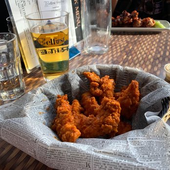 Belfast Gastropub - Chicken tenders Buffalo style and a nice cold Stella to wash it down. - Gastropubs Near Me - Lindenhurst, New York Belfast Gastropub - Chicken tenders Buffalo style and a nice cold Stella to wash it down. - Gastropubs Near Me - Lindenhurst, New York