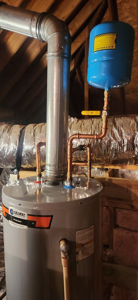 Slide of John's Drain Cleaning and Plumbing Services