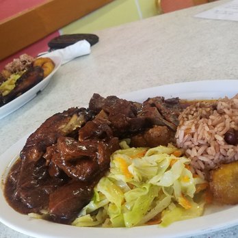 Helen's Kitchen - Around de Island plate( 3 meats, rice & peas, cabbage & plantains) - Caribbean Near Me - Houston, Texas Helen's Kitchen - Around de Island plate( 3 meats, rice & peas, cabbage & plantains) - Caribbean Near Me - Houston, Texas