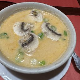 a bowl of soup with mushrooms a bowl of soup with mushrooms