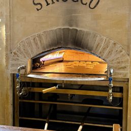 This is the oven where the bread... pita... magic happens. You can see them inside on the right. Absolutely incredible! This is the oven where the bread... pita... magic happens. You can see them inside on the right. Absolutely incredible!