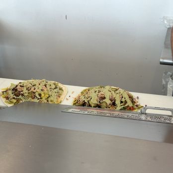 Wriggles - Fully loaded Turkey Bacon Wraps topped with the cilantro lime ranch dressing - Delis Near Me - Murray, Utah Wriggles - Fully loaded Turkey Bacon Wraps topped with the cilantro lime ranch dressing - Delis Near Me - Murray, Utah
