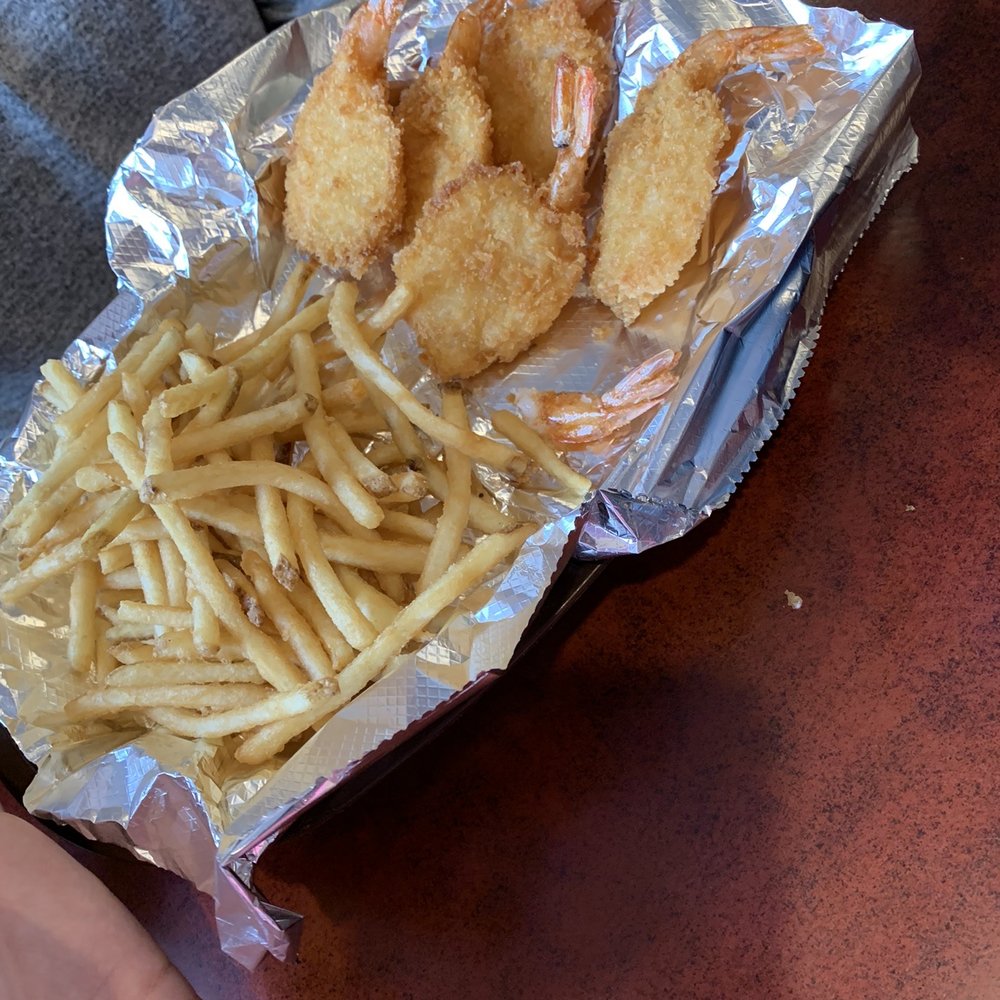 Partially eaten shrimp basket. My daughter started eating before I took the pic. Also came within two hush puppies. Partially eaten shrimp basket. My daughter started eating before I took the pic. Also came within two hush puppies.