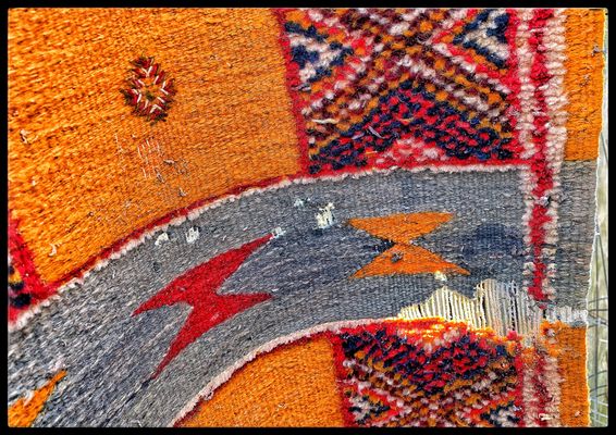 Photo of Hadeed Carpet - Alexandria, VA, US. Parts of this Moroccan rug were eaten down to the warp and woof threads. Clothes moths are fierce!