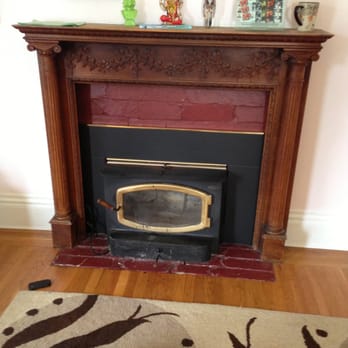 Domicile Construction - a fireplace in a living room - General Contractors Near Me Domicile Construction - a fireplace in a living room - General Contractors Near Me