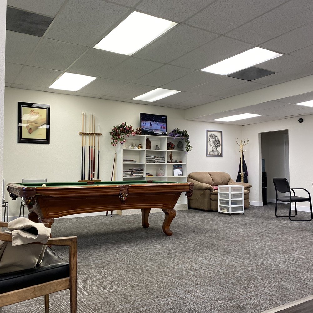 Great Cut - Seating area complete with a billiards table so you could play pool while waiting to get your haircut - Hair Salons Near Me - Sacramento, California Great Cut - Seating area complete with a billiards table so you could play pool while waiting to get your haircut - Hair Salons Near Me - Sacramento, California