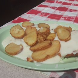 Biscuit and gravy with home fries! Biscuit and gravy with home fries!