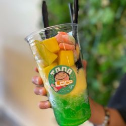 Todo Loco Mexican Antojitos - Crazy cup with watermelon shaved ice, mango ice cream and cut mango with gummy candy.