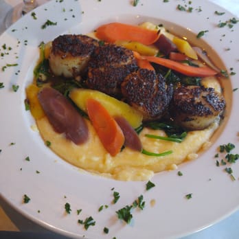 Laziza Craft Kitchen - Porcini-dusted scallops with creamy polenta, salty spinach and tri-colored carrots - Seafood Near Me - Kent, Ohio Laziza Craft Kitchen - Porcini-dusted scallops with creamy polenta, salty spinach and tri-colored carrots - Seafood Near Me - Kent, Ohio